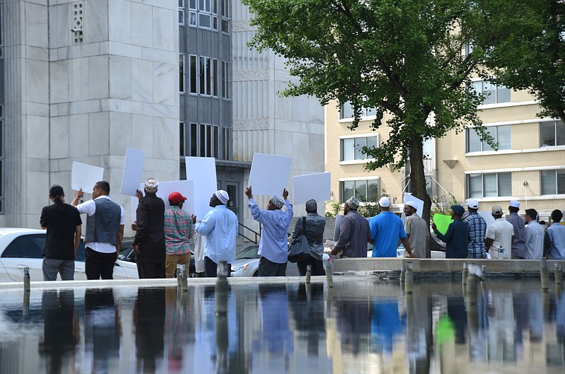 Muslims rally near the Joel W. Solomon Federal building Monday, July 13, 2015 to protest what they see as light treatment of Robert Doggart, who plotted to murder Muslims in Islamberg, N.Y. 