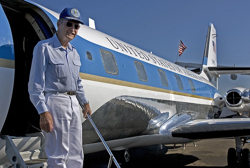 
              FILE - In this Aug. 8, 2010 file photo, retired Air Force Brig. Gen. Jim Cross stands on the steps of a JetStar that he flew for Lyndon B. Johnson, in Austin, Texas. Cross died Saturday, July 11, 2015, in Gatesville, Texas. He was 90. (AP Photo/Austin American-Statesman, Larry Kolvoord, File)
            