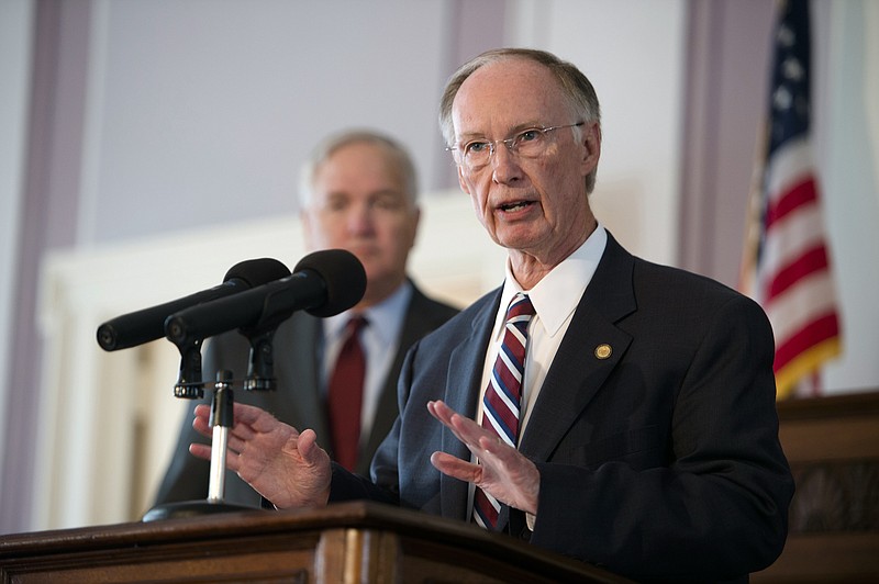Alabama Gov. Robert Bentley announces a state settlement with BP for the 2010 oil spill in the Gulf of Mexico, Thursday, July 2, 2015, at the Capitol building in Montgomery, Ala.
