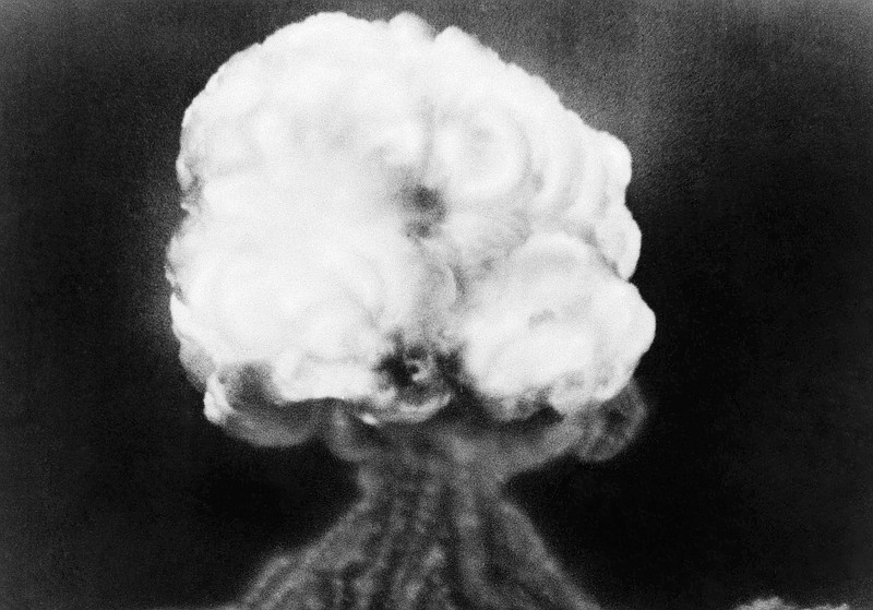 
              FILE - This July 16, 1945 photo, shows the mushroom cloud of the first atomic explosion at Trinity Test Site, New Mexico.  Thursday, July 16, 2015 marks the 70th anniversary of the Trinity Test in southern New Mexico comes amid renewed interest in the Manhattan Project thanks to new books, online video testimonies and the WGN America drama series “Manhattan.(AP Photo, File)
            