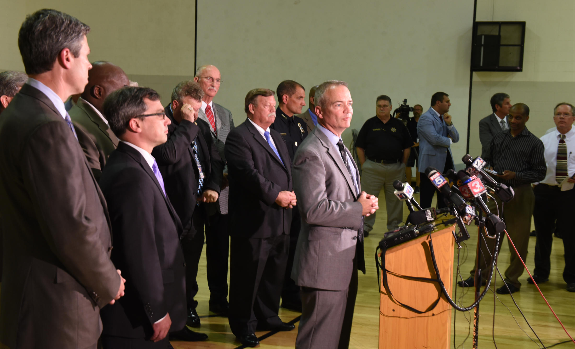 FBI Special Agent In Charge Ed Reinhold speaks from the podium during a news conference at the Chattanooga Fire Training center about a domestic terror incident that killed four Marines at the nearby Naval Reserve facility on Amnicola Highway on Thursday, July 16, 2015, in Chattanooga, Tenn.