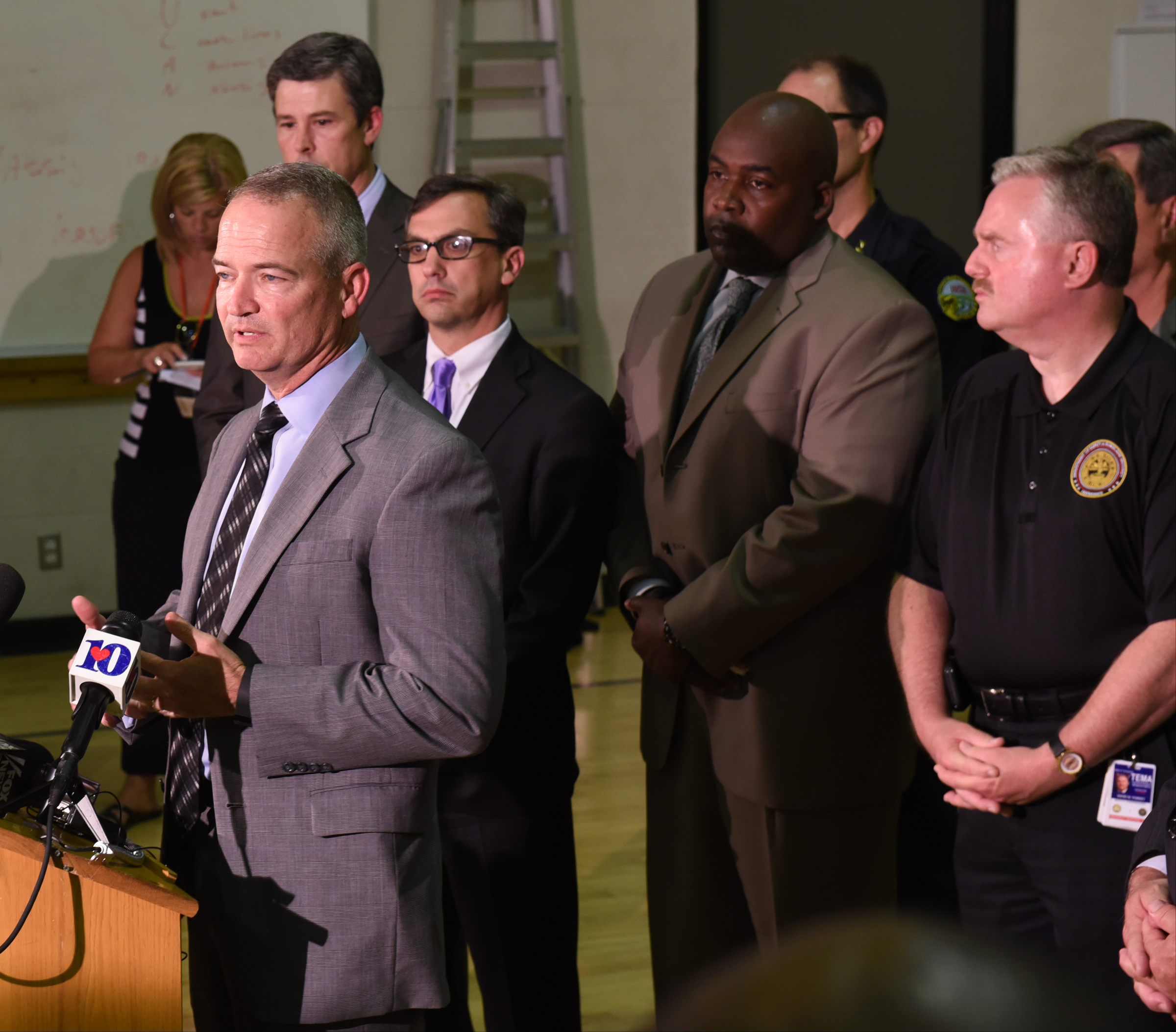 FBI Special Agent In Charge Ed Reinhold speaks from the podium during a news conference at the Chattanooga Fire Training center about a domestic terror incident that killed four Marines at the Naval Reserve facility on Amnicola Highway on Thursday, July 16, 2015, in Chattanooga, Tenn.