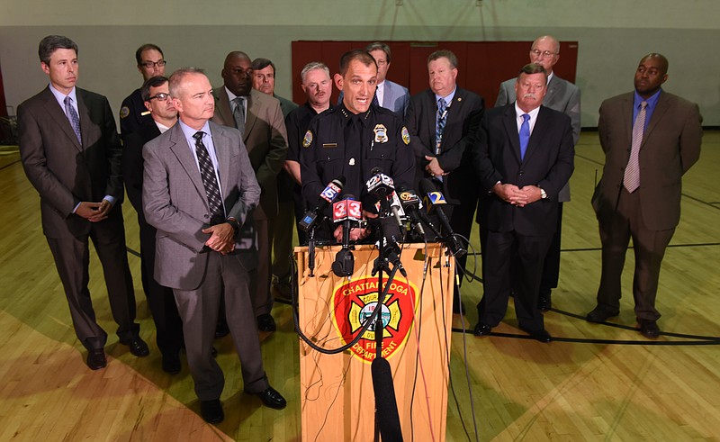 Chattanooga Police Department Chief Fred Fletcher speaks from the podium during a news conference at the Chattanooga Fire Training center about a domestic terror incident that killed four Marines at the Naval Reserve facility on Amnicola Highway on Thursday, July 16, 2015, in Chattanooga, Tenn.
