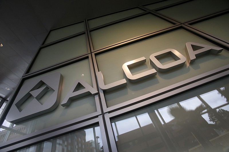 
              FILE - This April 7, 2014 file photo shows the Alcoa logo in the lobby of Alcoa's headquarters in Pittsburgh. Alcoa Inc.’s second-quarter 2015 profit was smaller than analysts expected, although its revenue topped estimates. (AP Photo/Gene Puskar, File)
            