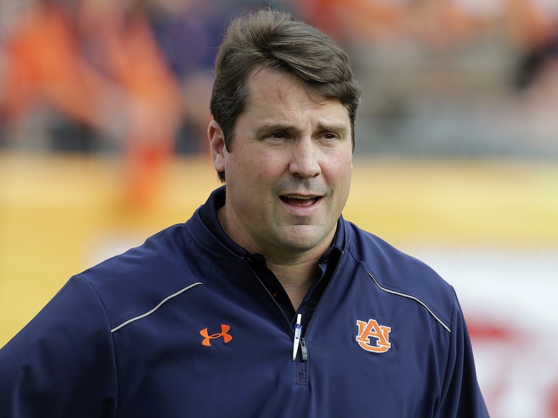 This Jan. 1, 2015, file photo shows newly-hired Auburn defensive coordinator Will Muschamp before the Outback Bowl NCAA college football game in Tampa, Fla. 