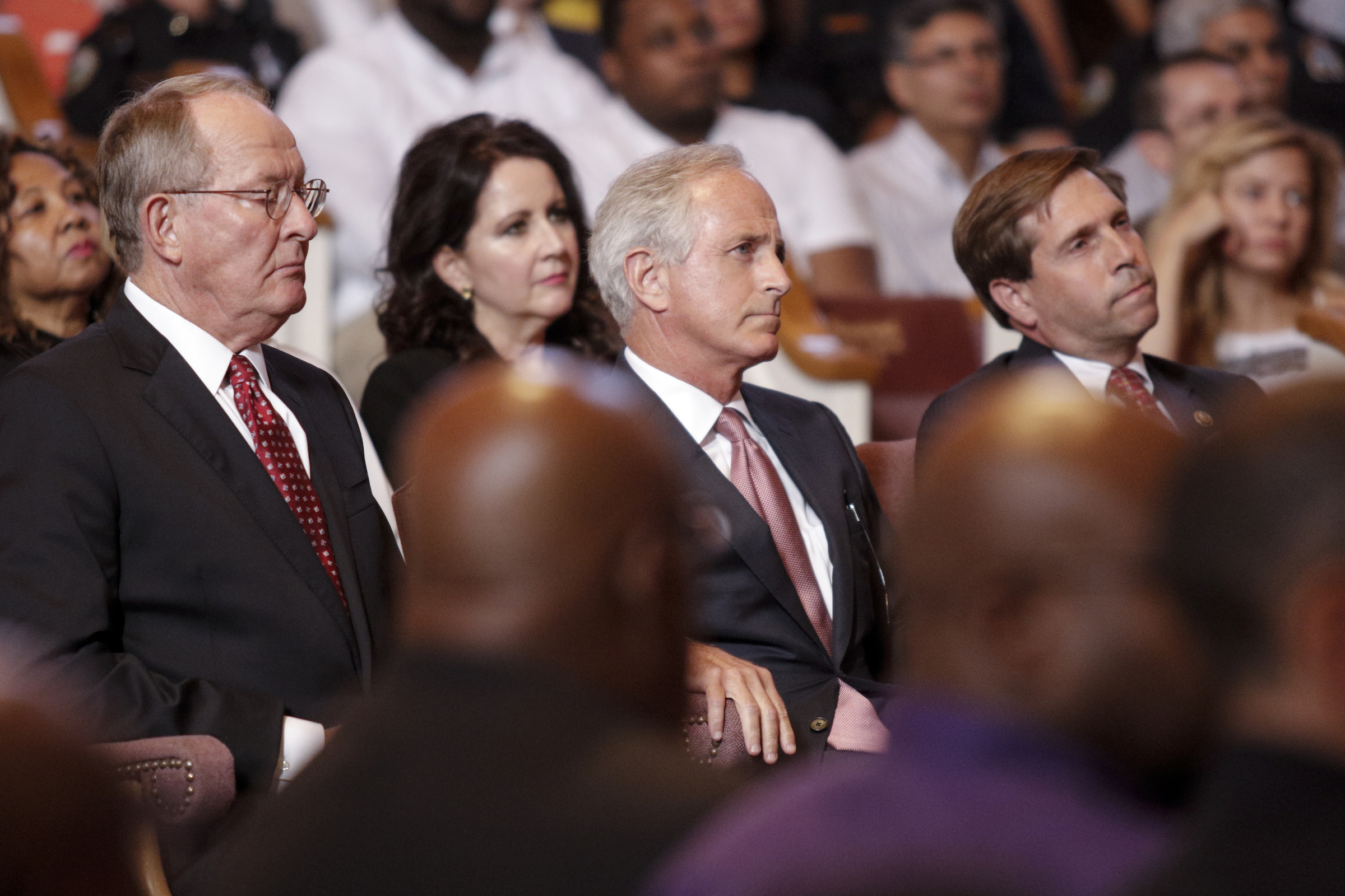 U.S. Sen. Lamar Alexander, U.S. Sen Bob Corker, and U.S. Rep. Chuck Fleischmann listen at an interfaith vigil at Olivet Baptist Church held in remembrance of victims of the July, 16 shootings on Friday, July 17, 2015, in Chattanooga, Tenn. The vigil was held one day after gunman Mohammad Youssef Abdulazeez shot and killed four U.S. Marines and wounded two others and a Chattanooga police officer at the Naval Operational Support Center on Amnicola Highway shortly after firing into the Armed Forces Career Center on Lee Highway.
