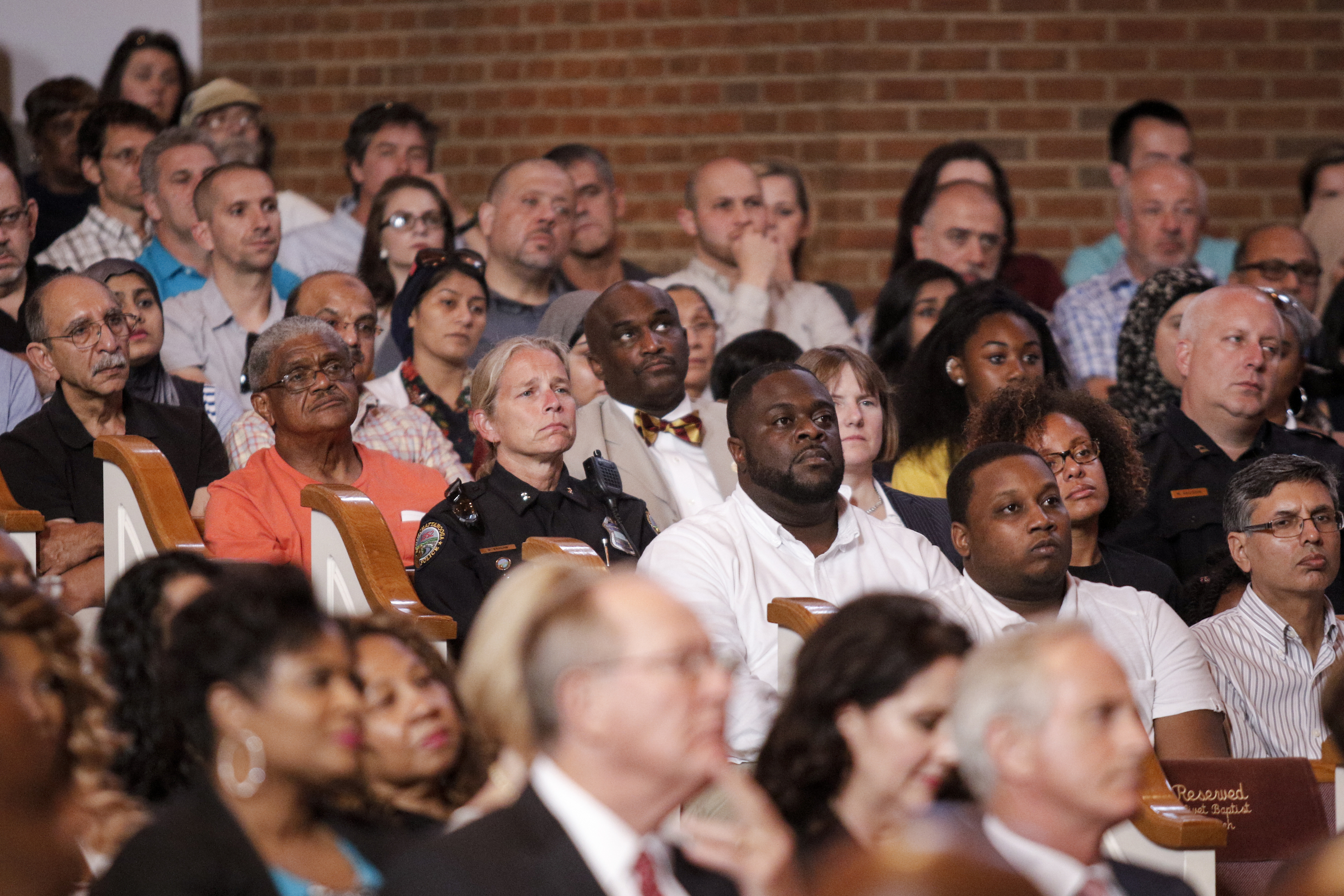 Supporters gather for an interfaith vigil at Olivet Baptist Church held in remembrance of victims of the July, 16 shootings on Friday, July 17, 2015, in Chattanooga, Tenn. The vigil was held one day after gunman Mohammad Youssef Abdulazeez shot and killed four U.S. Marines and wounded two others and a Chattanooga police officer at the Naval Operational Support Center on Amnicola Highway shortly after firing into the Armed Forces Career Center on Lee Highway.