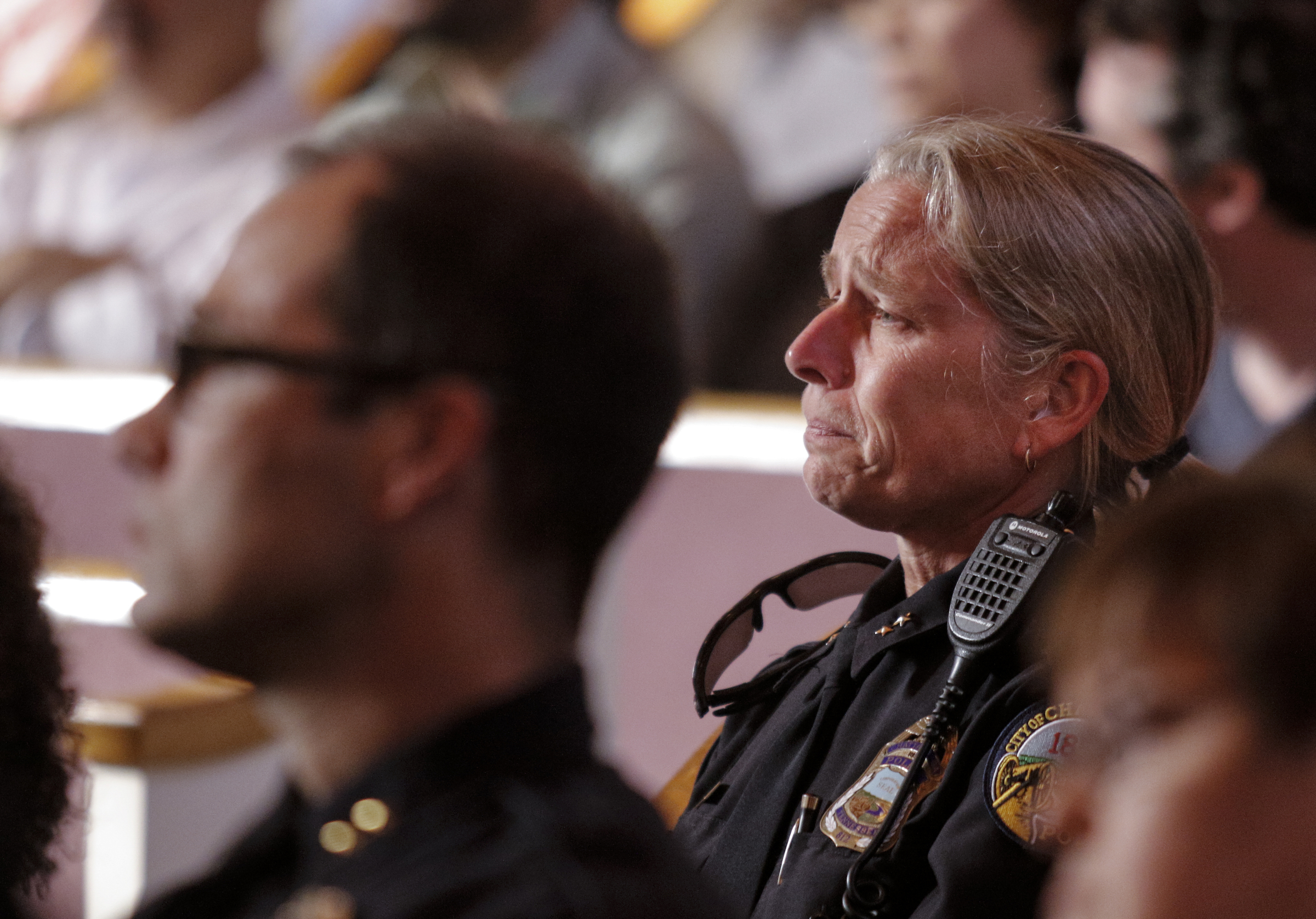 Chattanooga Assistant Police Chief Danna Vaughn listens during an interfaith vigil at Olivet Baptist Church held in remembrance of victims of the July, 16 shootings on Friday, July 17, 2015, in Chattanooga, Tenn. The vigil was held one day after gunman Mohammad Youssef Abdulazeez shot and killed four U.S. Marines and wounded two others and a Chattanooga police officer at the Naval Operational Support Center on Amnicola Highway shortly after firing into the Armed Forces Career Center on Lee Highway.