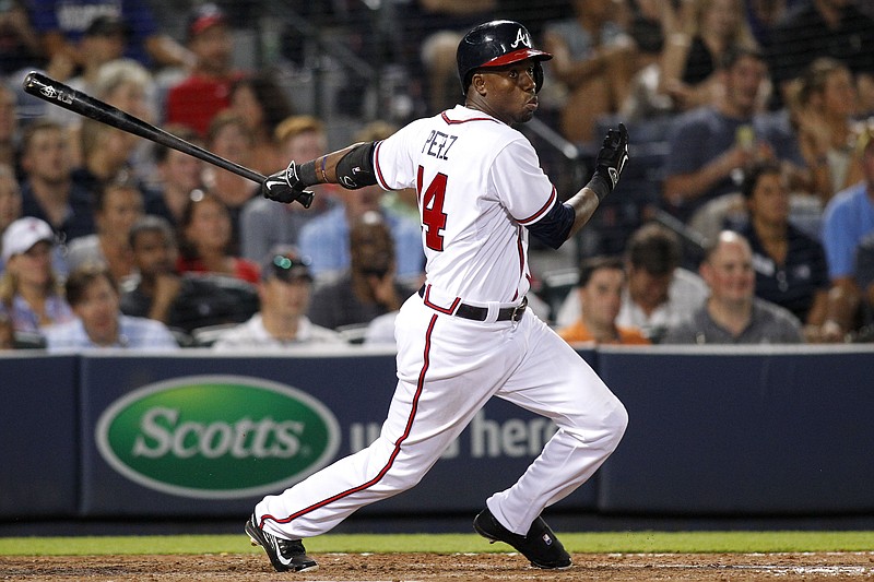 Atlanta Braves' Eury Perez watches a two-run single the eighth inning of a baseball game against the Chicago Cubs on Friday, July 17, 2015, in Atlanta.