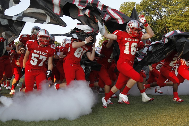 The Baylor football team takes the field against Bradley Central in this 2012 file photo.