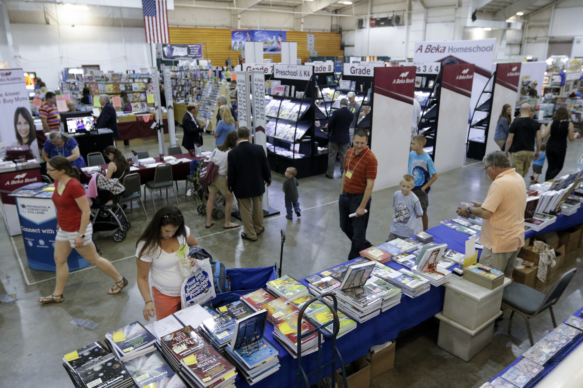People browse vendors at the 32nd Annual Education Expo & Homeschool Curriculum Fair on Saturday, July 18, 2015, at Camp Jordan Arena in Chattanooga, Tenn.