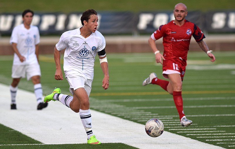 Chattanooga's Leo De Smedt (7) moves the ball upfield.  Chattanooga FC hosted the Miami Fusion in soccer playoff action at  Finley Stadium Saturday night, July 18, 2015
