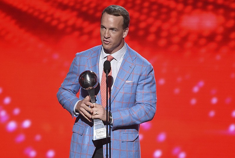 Denver Broncos quarterback Peyton Manning accepts the award for best record-breaking performance at the ESPY Awards earlier this month in Los Angeles.