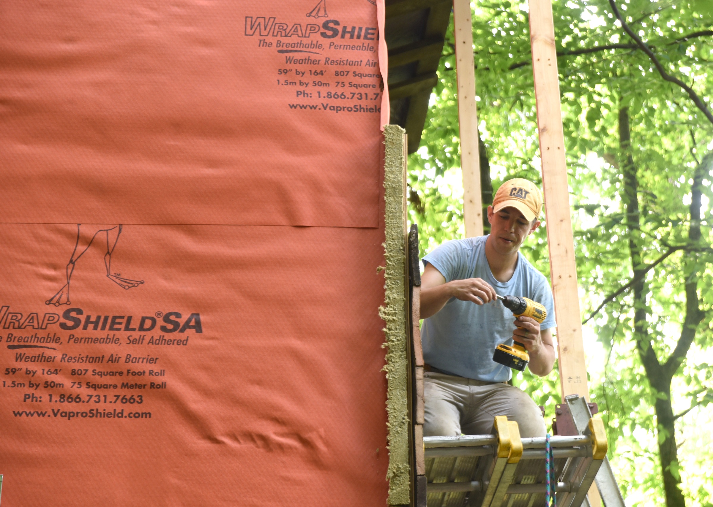 Andrew Alms works on the treehouse in Flintstone, Ga.