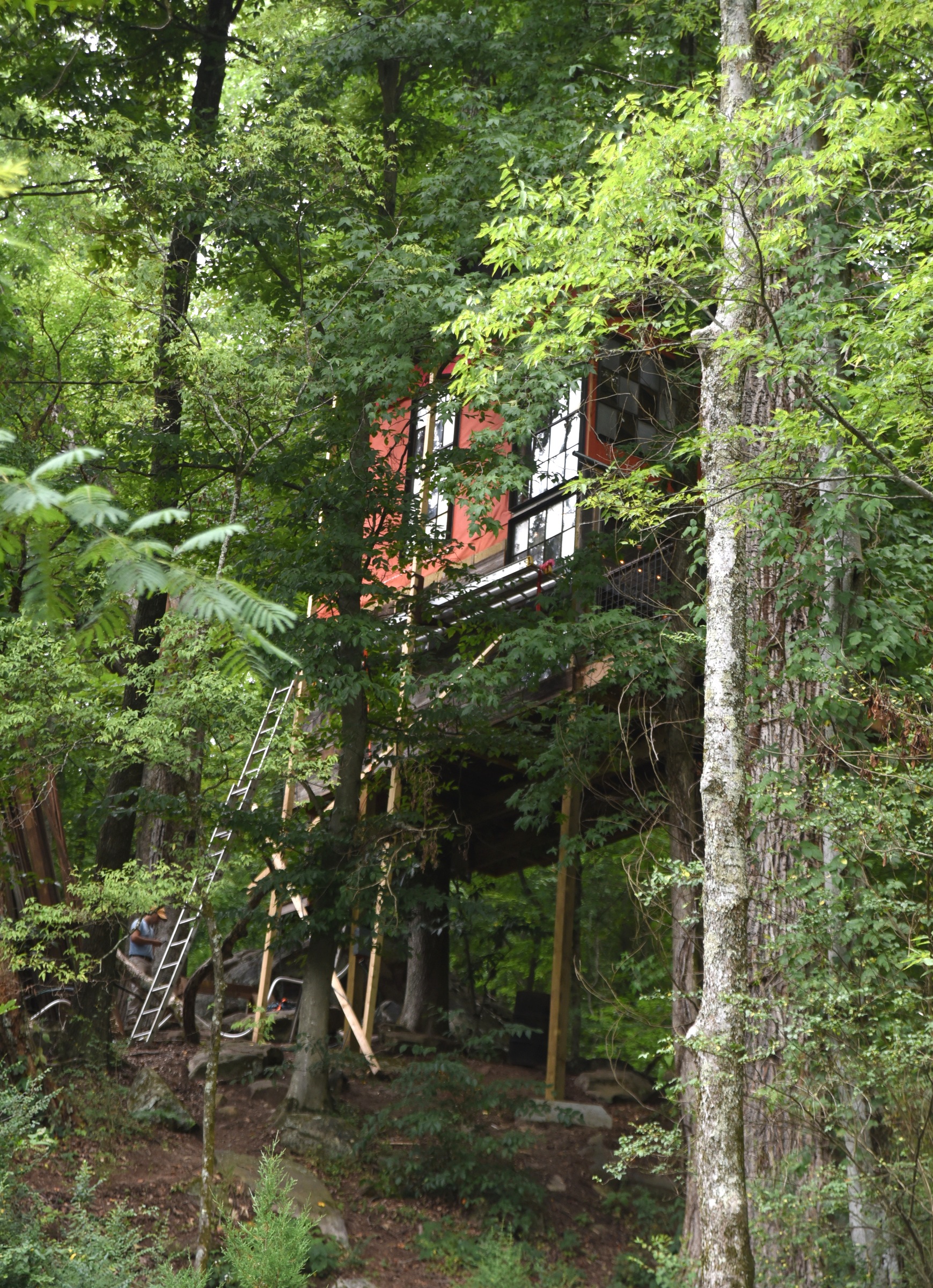 The treehouse is nestled in the woods of Flintstone, Ga.