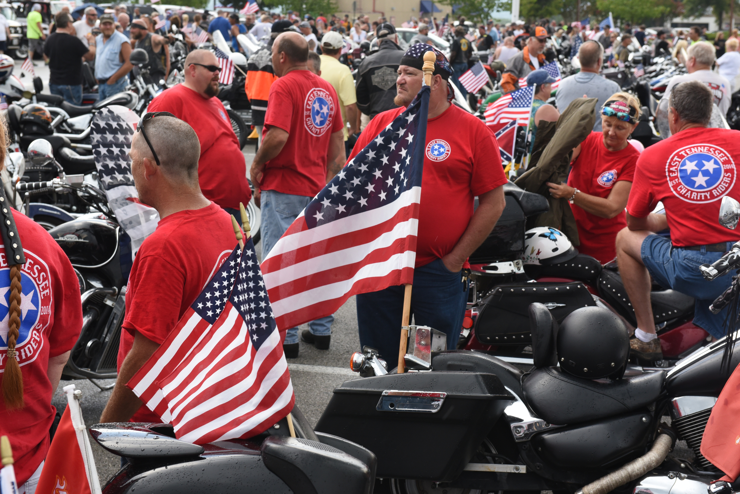 Motorcyclists gather in a parking lot on Lee Highway on Sunday, July 19, 2015, in Chattanooga, Tenn., as they prepare to ride from the U.S. Naval and Marine Reserve Center on Amnicola Highway in the aftermath of a Thursday terrorist attack at those two facilities that killed four Marines and one member of the U.S. Navy.