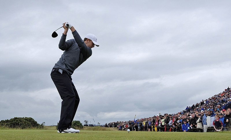 
              United States’ Jordan Spieth plays from the fifth tee during the third round at the British Open Golf Championship at the Old Course, St. Andrews, Scotland, Sunday, July 19, 2015. (AP Photo/David J. Phillip)
            