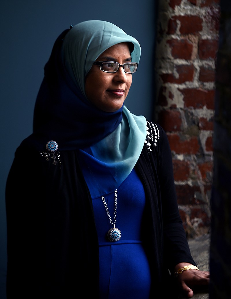 
              ADVANCED FOR RELEASE SUNDAY, JULY 19, 2015 Muslim activist Sabina Mohyuddin of Tullahoma, here July 1, 2015, has faced down dozens of angry anti-Muslim protestors in Middle Tennessee. (Shelley Mays / The Tennessean via AP)
            