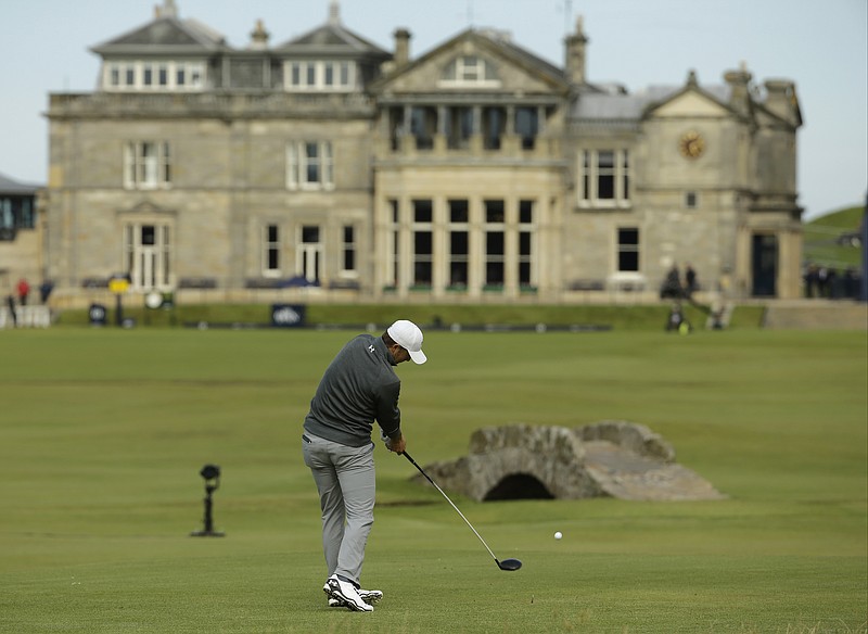 United States' Jordan Spieth drives the ball from the 18th tee during the third round of the British Open Golf Championship at the Old Course, St. Andrews, Scotland, Sunday, July 19, 2015.