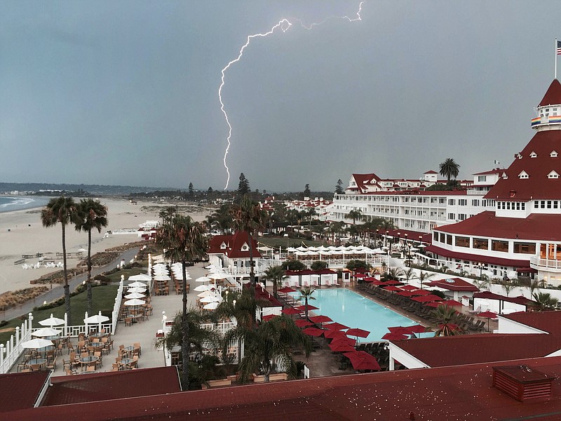 In this Saturday, July 18, 2015, photo provided by Brook Taylor, a lightning storm is captured from the Hotel Del Coronado in San Diego, Calif. (Brook Taylor via AP) MANDATORY CREDIT