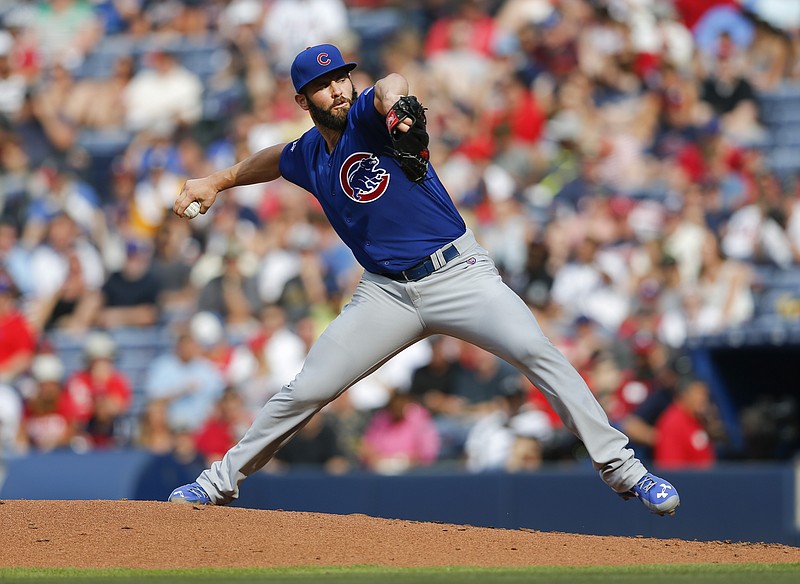 Chicago Cubs starting pitcher Jake Arrieta (49) works in the third inning of a baseball game against the Atlanta Braves Sunday, July 19, 2015, in Atlanta. 