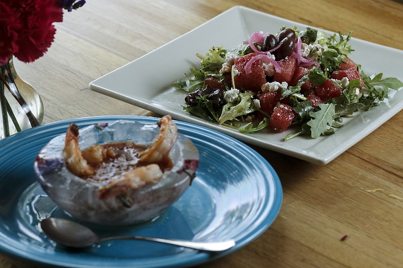 A gazpacho dish and watermelon salad, seen here prepared by 212 Market, are good choices if you don't want to turn on your oven during the heat of summer.
