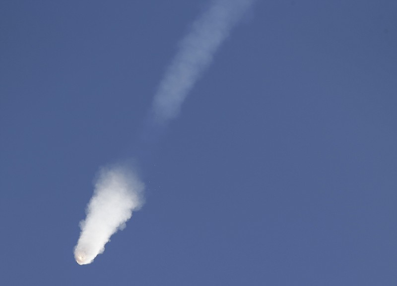 
              FILE - In this June 28, 2015, file photo, the SpaceX Falcon 9 rocket and Dragon spacecraft breaks apart shortly after liftoff from the Cape Canaveral Air Force Station in Cape Canaveral, Fla. SpaceX suspects the steel strut snapped inside its rocket and led to last month's launch accident. The company's founder and chief executive, Elon Musk, said Monday, July 20 that these struts had flown many times before without any problem. (AP Photo/John Raoux, File)
            