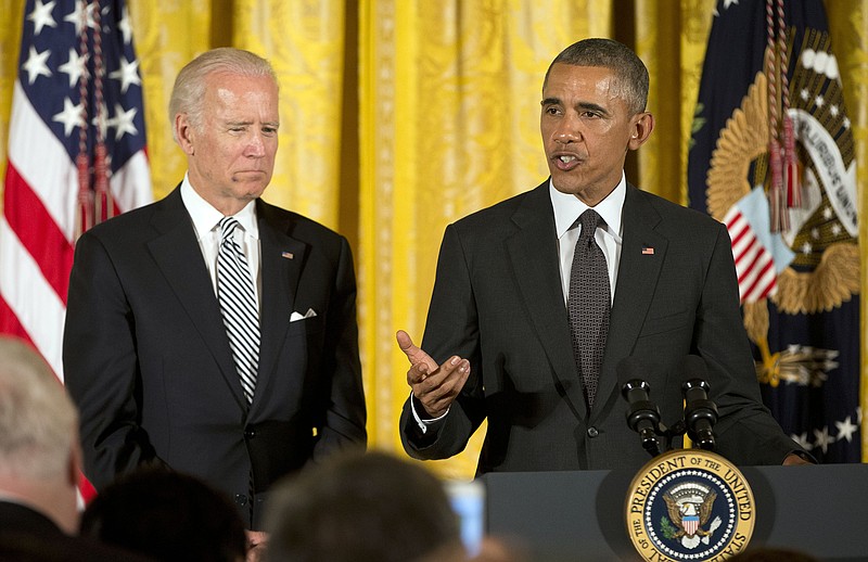 
              President Barack Obama with Vice President Joe Biden, speaks at a reception in the East Room of the White House in Washington, Monday, July 20, 2015. Obama spoke regarding the 25th anniversary of the Americans with Disabilities Act. (AP Photo/Pablo Martinez Monsivais)
            