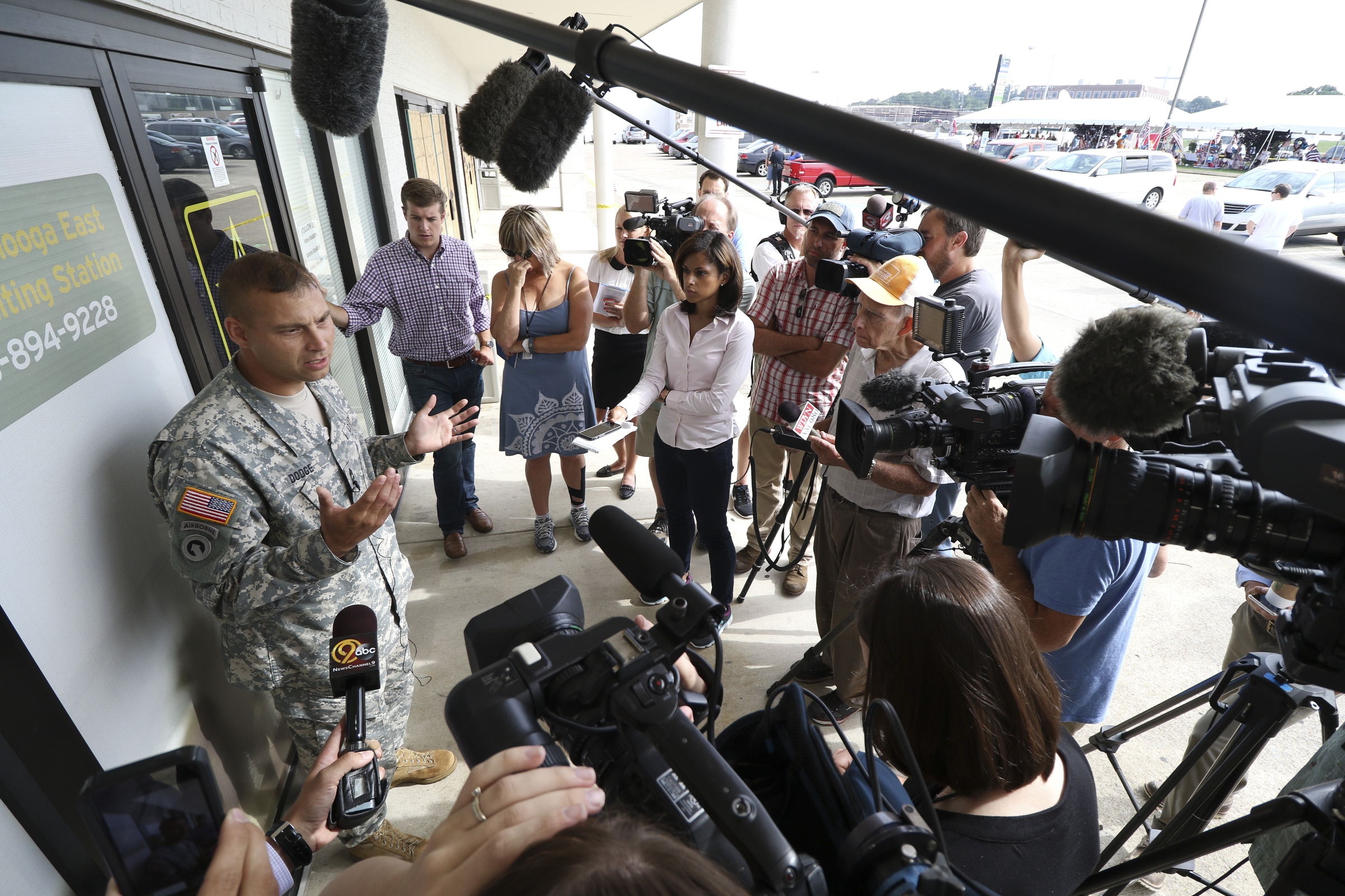 SFC Robert Dodge speaks to media outside of the Armed Forces Career Center off of Lee Highway after he and other Army representatives met Chattanooga Mayor Andy Berke and Police Chief Fred Fletcher on Tuesday, July 21, 2015 to thank them for the quick response during the July 16, 2015 terror shootings.