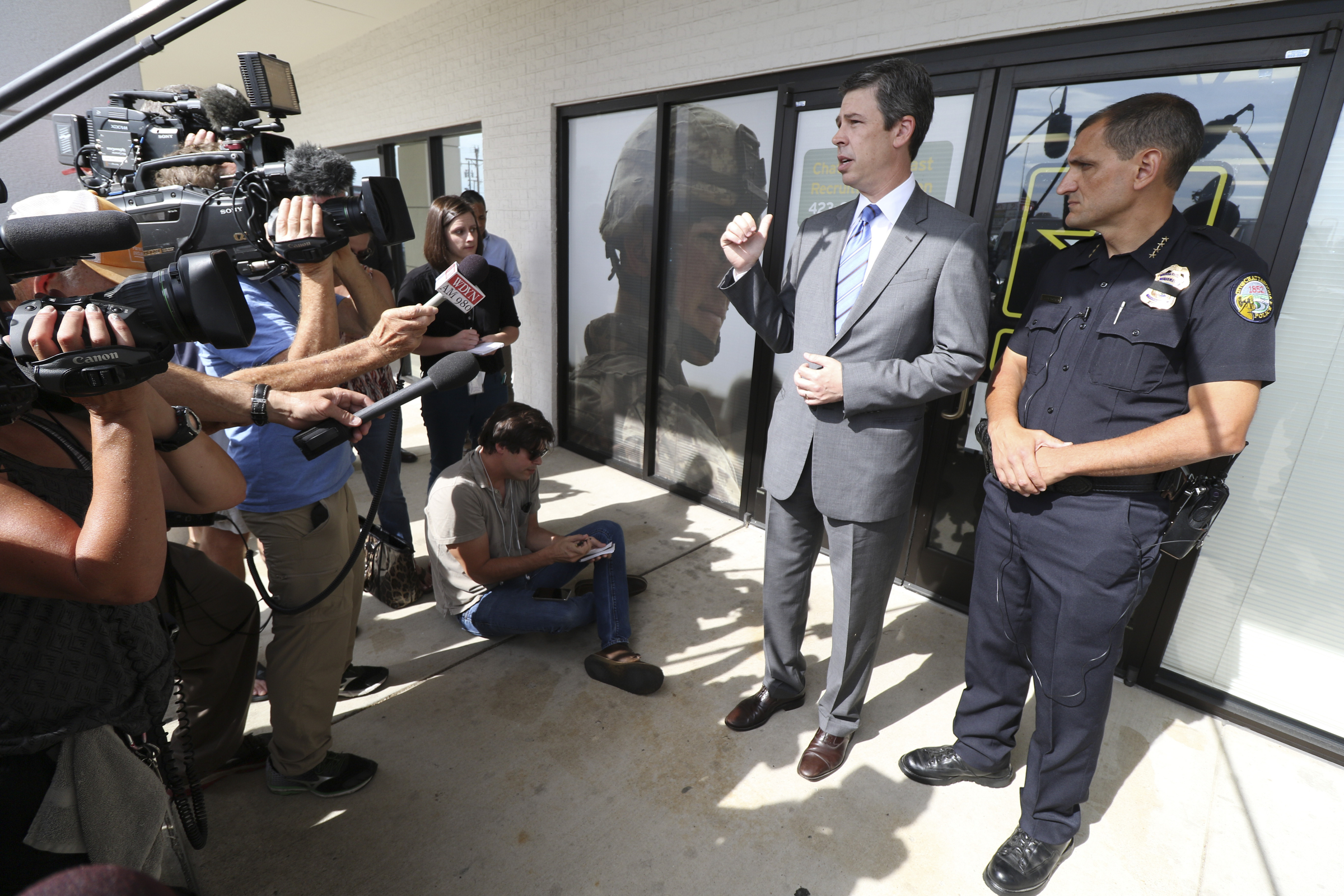 Chattanooga Mayor Andy Berke and Police Chief Fred Fletcher speak to media outside of the Armed Forces Career Center off of Lee Highway on Tuesday, July 21, 2015 about the July 16, 2015 terror shootings.