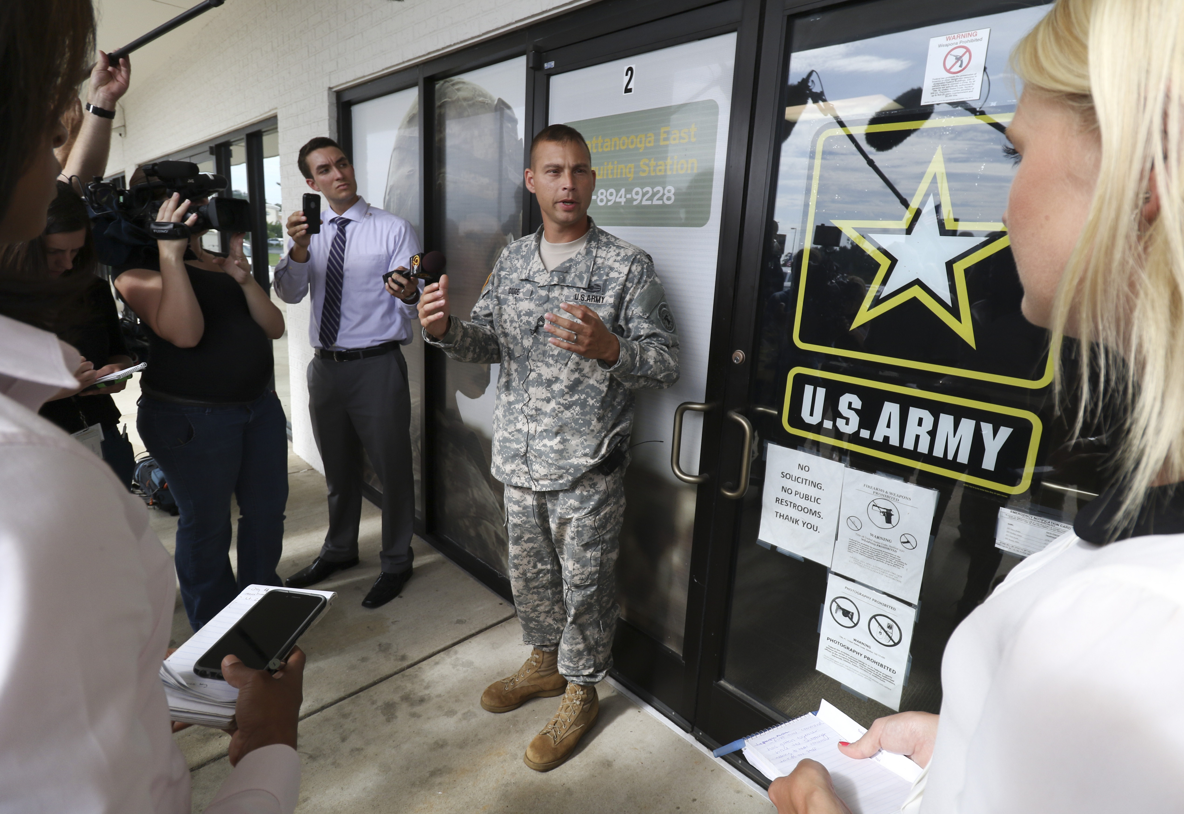 SFC Robert Dodge speaks to media outside of the Armed Forces Career Center off of Lee Highway after he and other Army representatives met Chattanooga Mayor Andy Berke and Police Chief Fred Fletcher on Tuesday, July 21, 2015 to thank them for the quick response during the July 16, 2015 terror shootings.