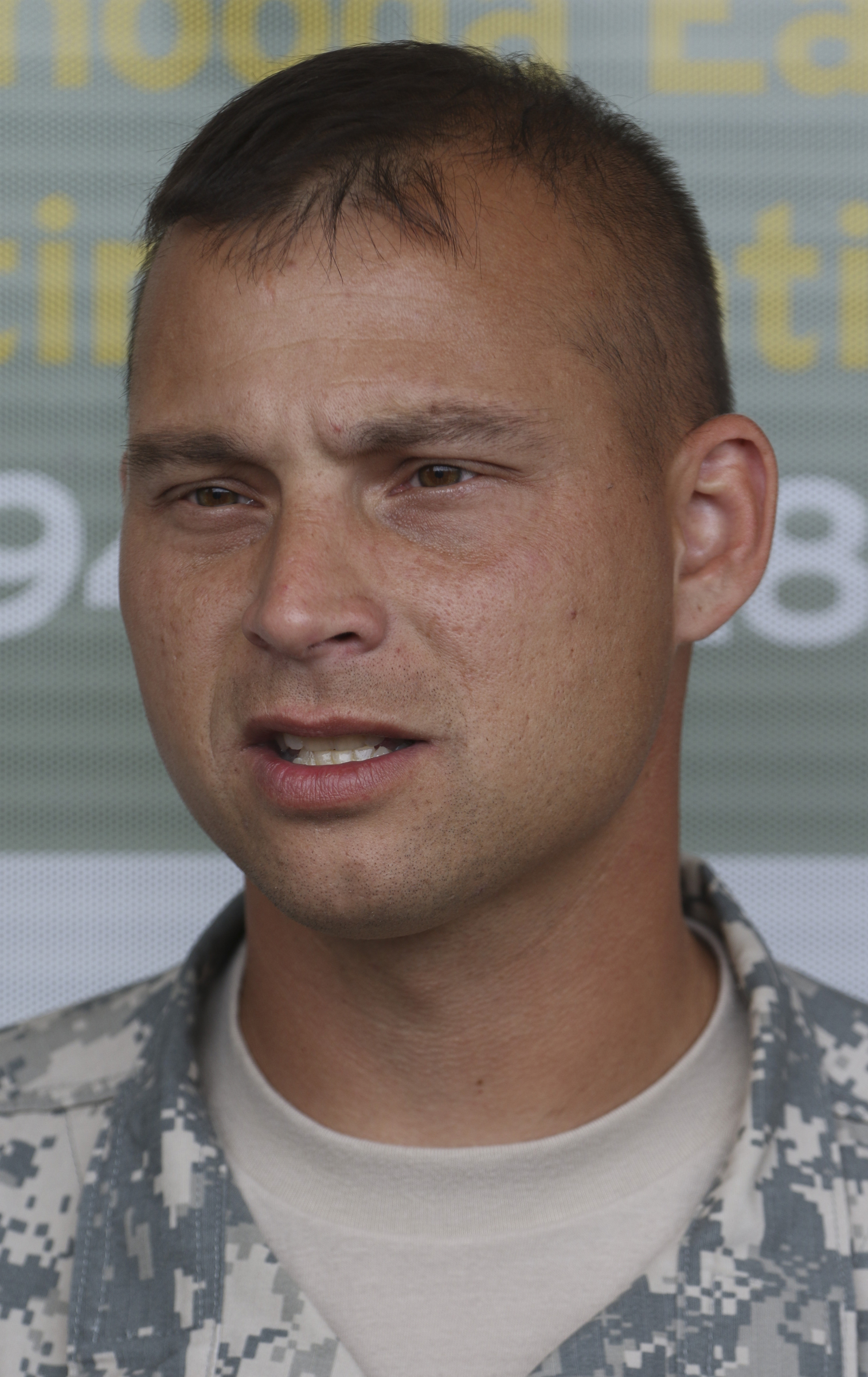 SFC Robert Dodge speaks to media outside of the Armed Forces Career Center off of Lee Highway after he and other Army representatives met Chattanooga Mayor Andy Berke and Police Chief Fred Fletcher on Tuesday, July 21, 2015 to thank them for the quick response during the July 16, 2015 terror shootings.