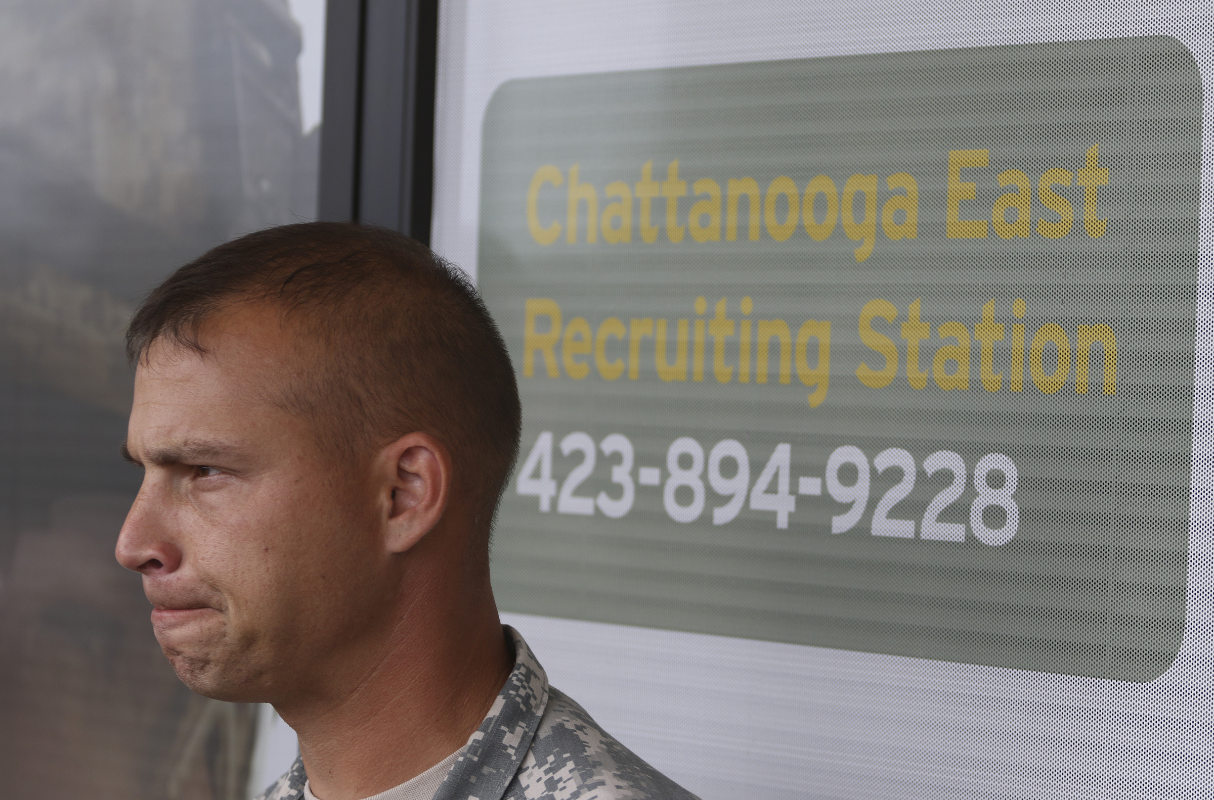 SFC Robert Dodge speaks to media outside of the Armed Forces Career Center off of Lee Highway after he and other Army representatives met Chattanooga Mayor Andy Berke and Police Chief Fred Fletcher on Tuesday, July 21, 2015 to thank them for the quick response during the July 16, 2015 terror shootings.