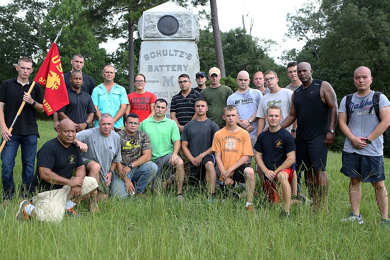 The Marines of Battery M, 3rd Battalion, 14th Marine Regiment pose for a picture with Col. Joseph Russo, commanding officer of 14th Marine Regiment, in front of Schultz's Battery M monument at Chickamauga and Chattanooga National Military Park in Fort Oglethorpe on Monday. U.S. Marine Corps photo by Cpl. Sara Graham