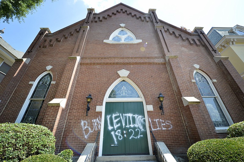 
              The front entrance of the Metropolitan Community Church of Our Redeemer in Augusta, Ga. that was vandalized overnight is seen Tuesday morning July 21, 2015. The Church's pastor, Rick Sosbe, and his fiancee, Michael Rhen, recently became the first same-sex couple to get a marriage license in Augusta-Richmond County following the recent decision by the US Supreme Court legalizing gay marriage.  (Michael Holahan/Augusta Chronicle via AP)
            