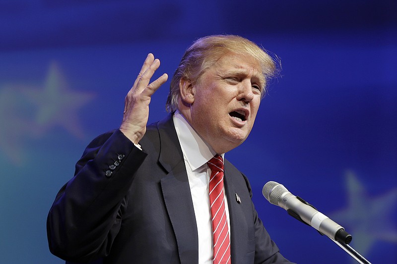 
              In this July 17, 2015, file photo, Republican presidential hopeful Donald Trump speaks at the Republican Party of Arkansas Reagan Rockefeller dinner in Hot Springs, Ark. Trump faced an avalanche of fresh criticism July 20 for questioning Sen. John McCain's heroism. But he’s getting no pressure at all from the one community that could push a candidate out of the 2016 presidential race: political donors. (AP Photo/Danny Johnston)
            