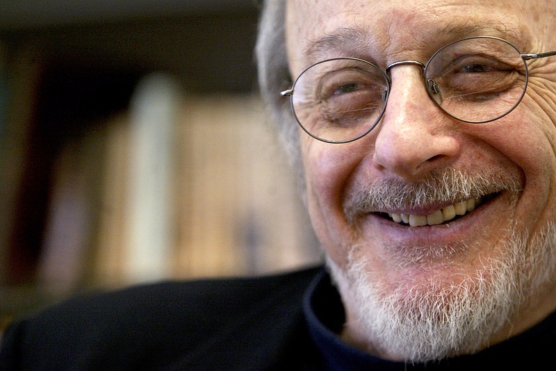 In this April 27, 2004, file photo, American author E.L. Doctorow smiles during an interview in his office at New York University in New York.