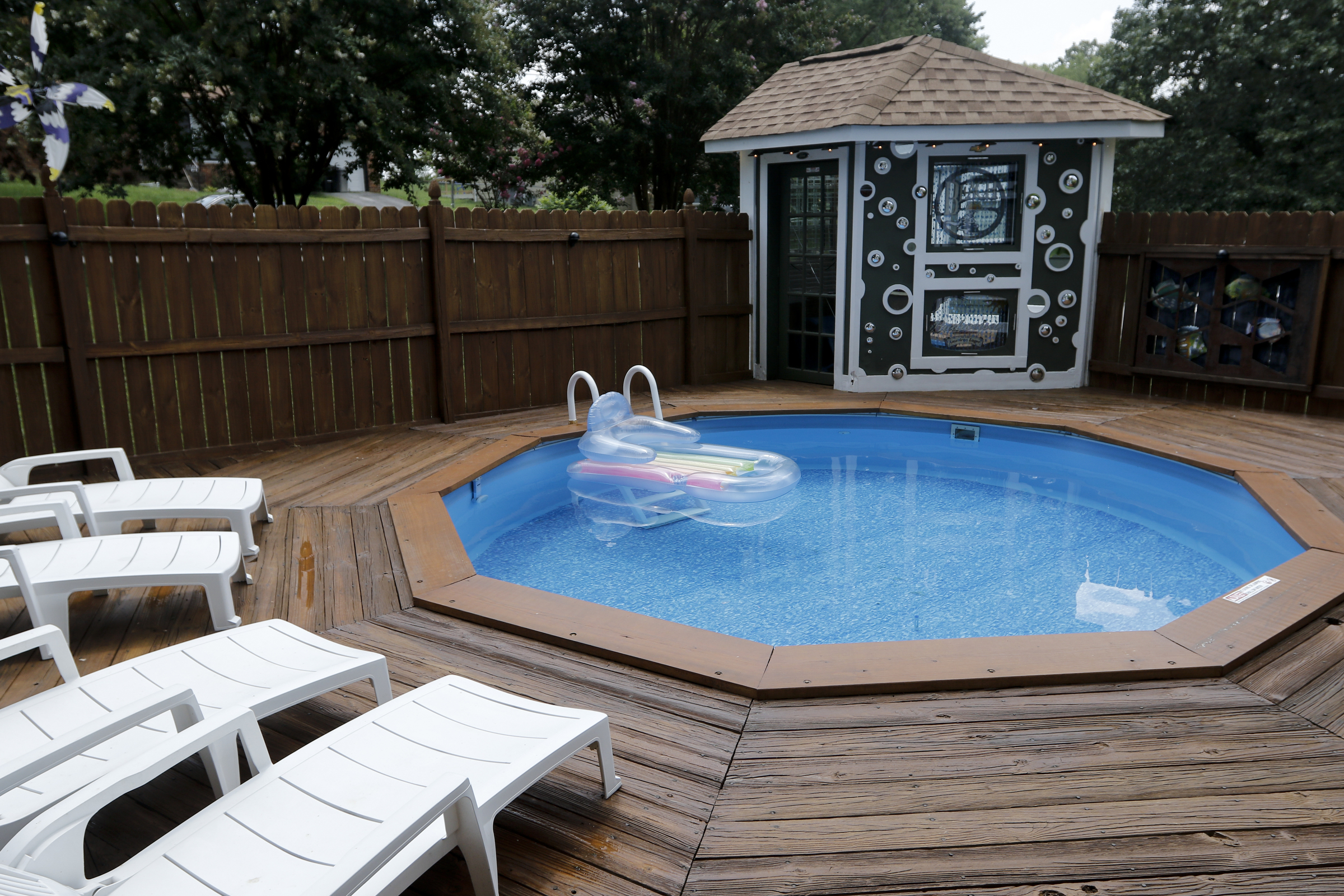 The above ground pool of Larry and Shannon Bennett and its surrounding deck work is seen Saturday, July 18, 2015, at their home in Ooltewah, Tenn.