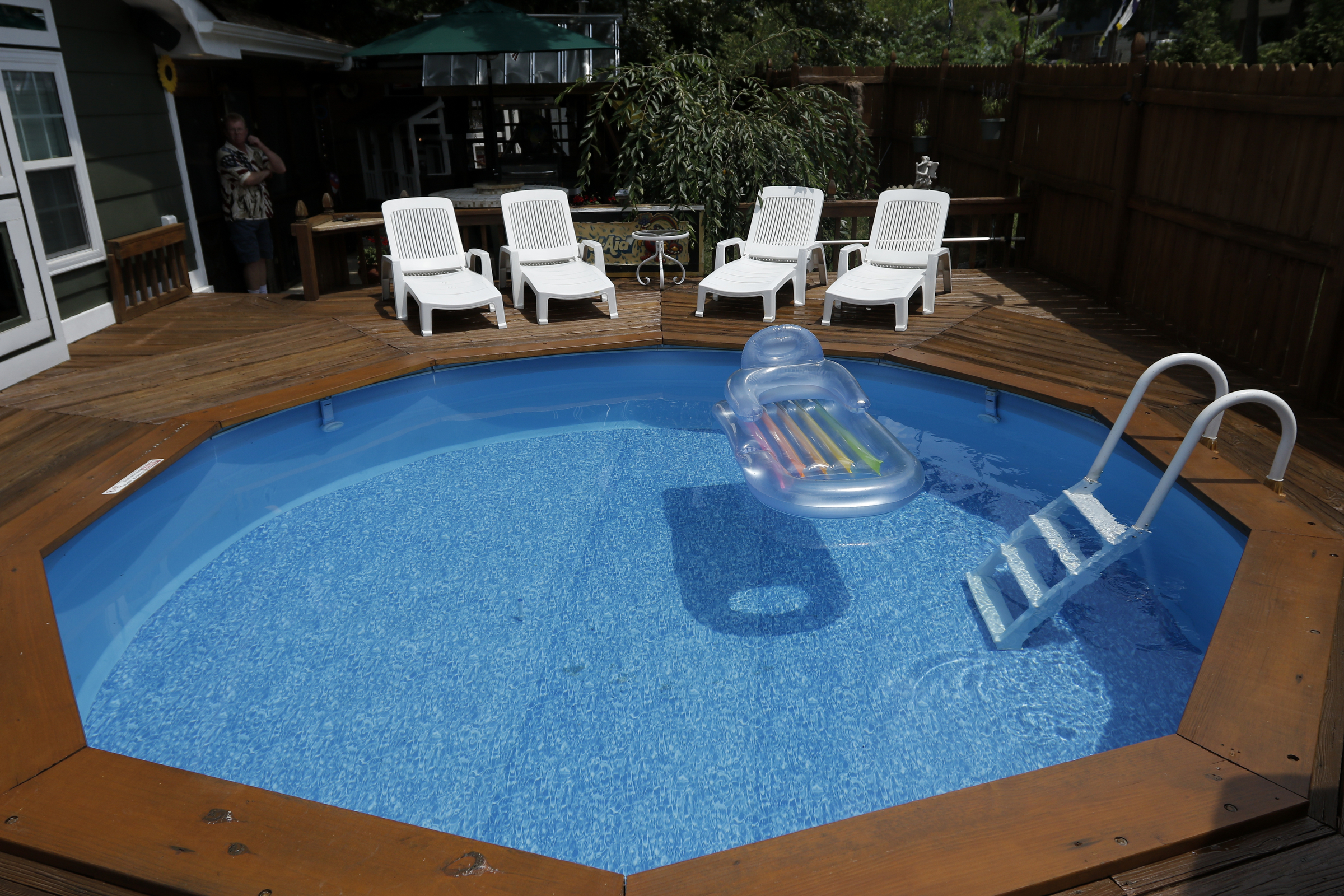 The above ground pool of Larry and Shannon Bennett and its surrounding deck work is seen Saturday, July 18, 2015, at their home in Ooltewah, Tenn.