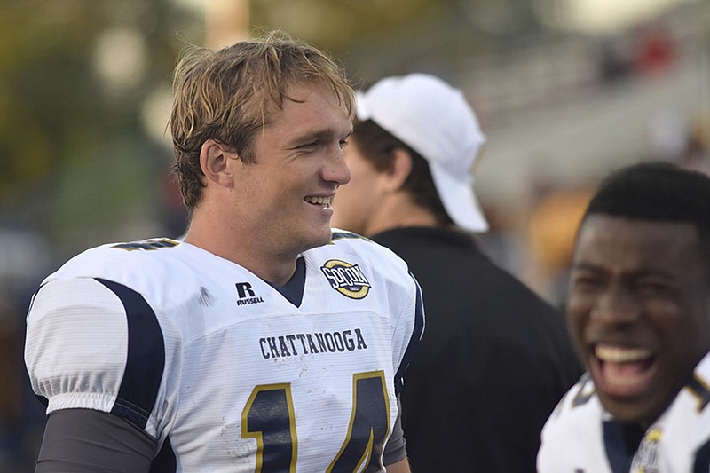 UTC quarterback Jacob Huesman, left, who is preparing for his senior season with the Mocs, is the preseason pick for Southern Conference offensive player of the year. He won the postseason version of the award the past two years.