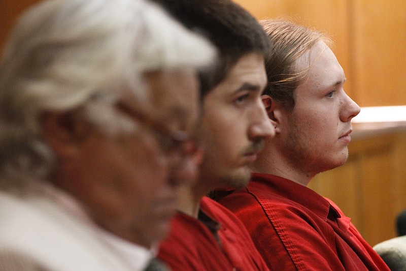 Staff Photo by Dan Henry / The Chattanooga Times Free Press- 5/28/14. Derek Morse, 19, middle and Skylar Allen, 22, right, sit in Judge Christie Mahn Sell's courtroom while having their case bound over to the grand jury both being charged in the April 9 triple murder in Lookout Valley.