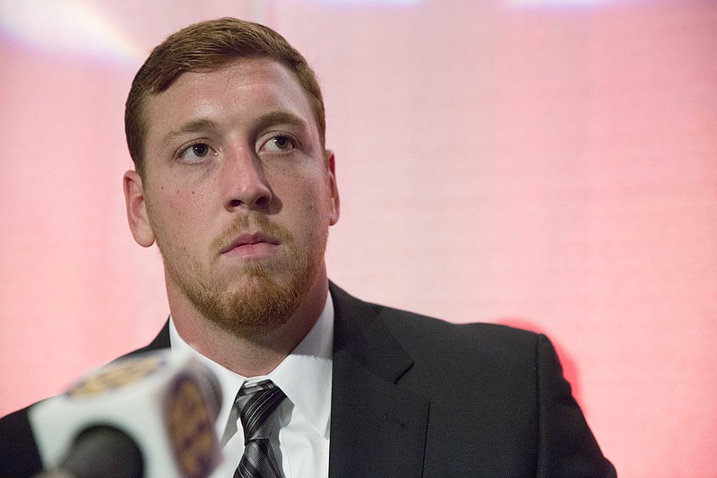 Georgia offensive lineman John Theus speaks to the media at the Southeastern Conference NCAA college football media days Thursday, July 16, 2015, in Hoover, Ala.