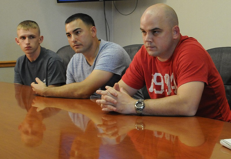 Three United States Marines, from left, Pfc. Aaron Noyes, Sgt. Jeff Cantu and Staff Sgt. Christopher "Chase" Estep talk to the Times Free Press about Thursday's attack, July 16, 2015.