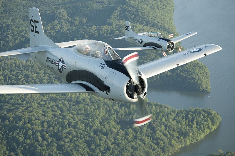 Pilots fly historic fighter aircraft in this photo.