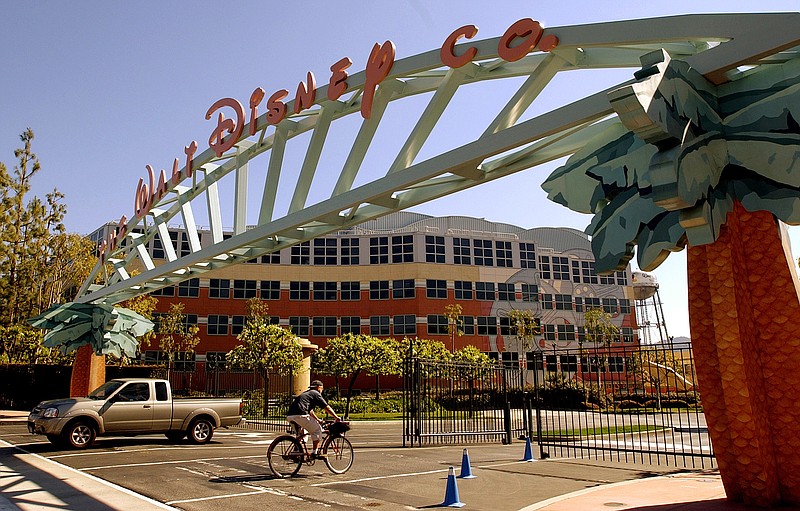 
              FILE - In this Feb. 11, 2004, file photo, shows the entrance to the Walt Disney Corp. office and studio complex in Burbank, Calif. The European Union announced Thursday, July 23, 2015, that it has opened an antitrust case against six major U.S. movie studios, including Disney,  for what it sees as a restriction of trade within the 28-nation bloc because consumers outside Britain and Ireland are prevented from tapping into their products through Sky UK. The other studios include NBCUniversal, Paramount Pictures, Sony, Twentieth Century Fox and Warner Bros. (AP Photo/Reed Saxon, File)
            