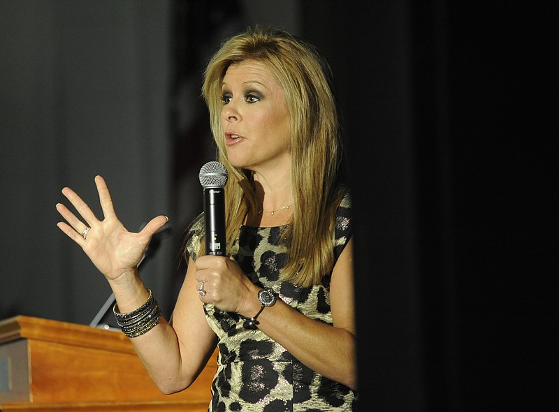 In this 2011 photo, Leigh Anne Tuohy speaks at a Mountain Education Foundation fundraising event at Signal Mountain Middle School. Tuohy will discuss and sign her new book, "Turn Around," during her appearance at the She Expo on Saturday at the Chattanooga Convention Center.