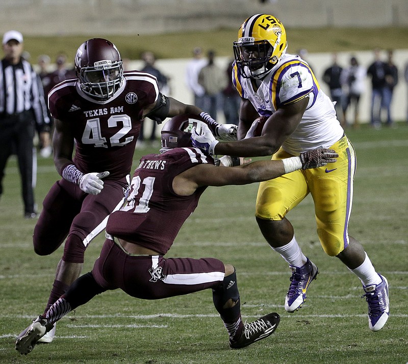 LSU tailback Leonard Fournette, shown here powering through Texas A&M's defense for a touchdown last November, rushed for 1,034 yards as a touted freshman.
