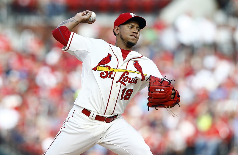 St. Louis Cardinals starting pitcher Carlos Martinez throws during the first inning of a baseball game against the Atlanta Braves, Saturday, July 25, 2015, in St. Louis.