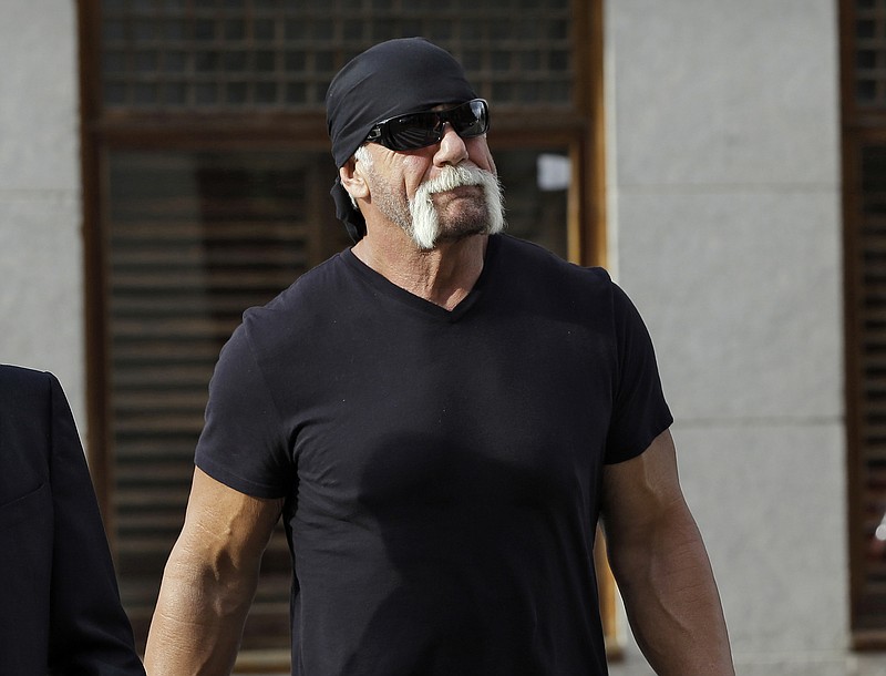 
              FILE - In this Oct. 15, 2012 file photo, former professional wrestler Hulk Hogan, whose real name is Terry Bollea, arrives for a news conference at the United States Courthouse in Tampa, Fla. Hogan is taking to Twitter in the aftermath of his thanked fans for his support through a series of tweets this weekend after being released from Wrestling Entertainment Inc.  (AP Photo/Chris O'Meara, File)
            