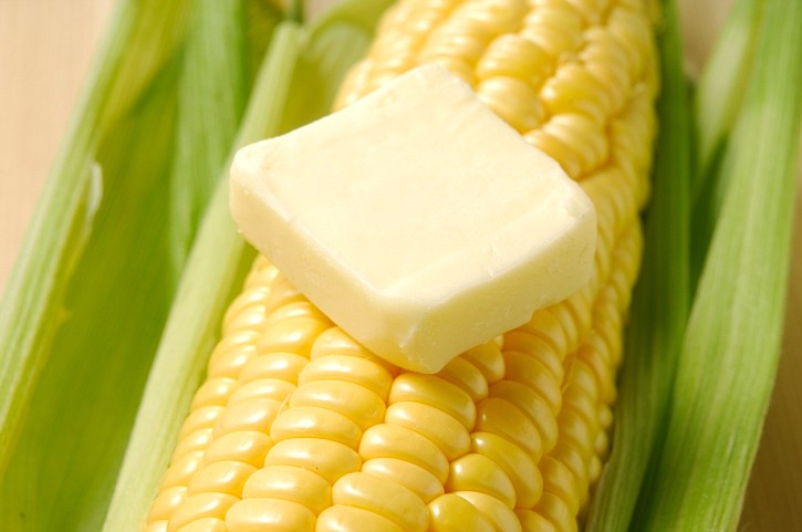 Butter melting on corn on the cob.